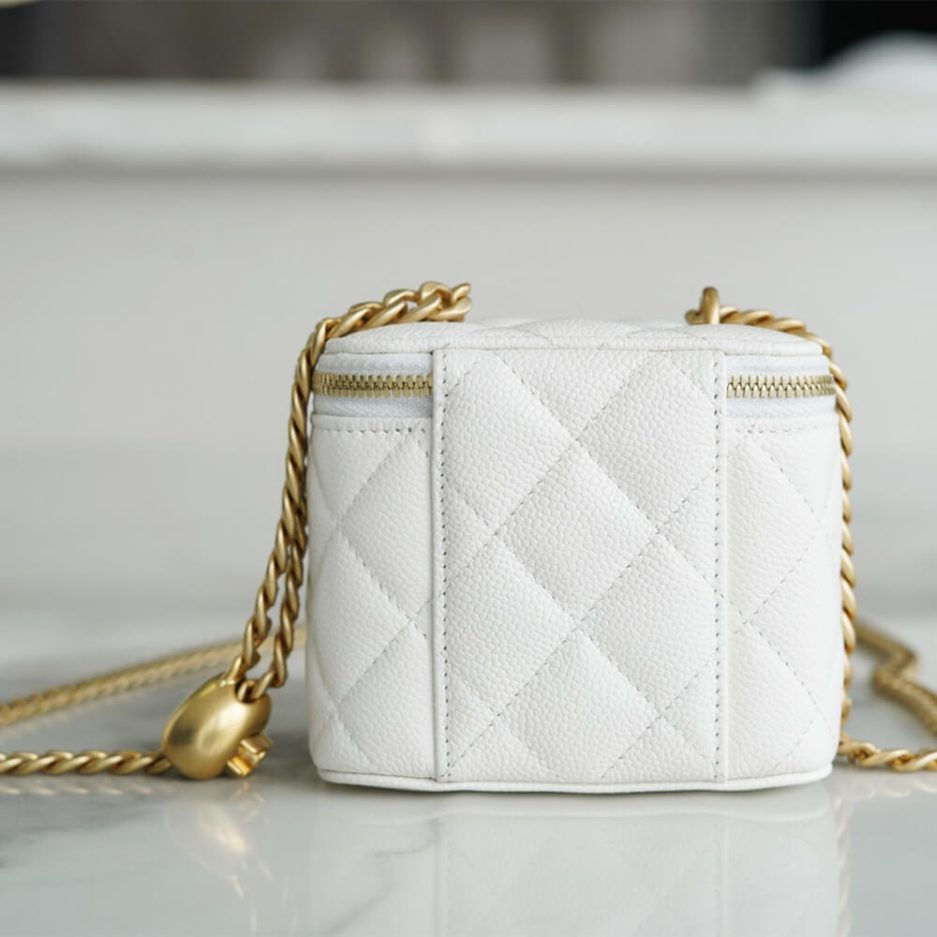 Ch*el small gold ball makeup bag